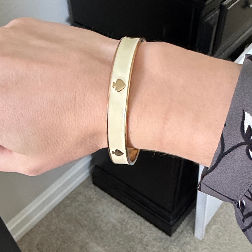 kate spade cream enamel bangle with gold spade accents